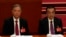 FILE - Chinese Premier Li Keqiang, right, and Wang Yang, a former vice premier, attend the closing ceremony of the 20th National Congress of China's ruling Communist Party at the Great Hall of the People in Beijing, Oct. 22, 2022.
