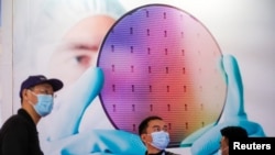 中国上海2021年3月举办一次半导体技术展。（路透社）