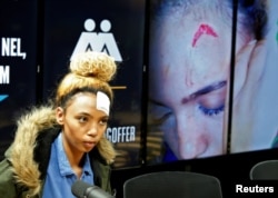 FILE - Gabriella Engels, who claims to have been assaulted by Grace Mugabe, arrives for a news conference in Pretoria, South Africa, Aug. 17, 2017.