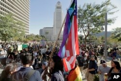 East Los Angeles high school students protest against the election of President-elect Donald Trump downtown Los Angeles, Nov. 14, 2016.