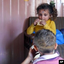 Nancy's mother says her temporary apartment is infested with mice or rats. When she was 2-years-old, Nancy was bitten several times in the face.