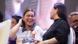 FILE - Sara Duterte, Davao City Mayor and daughter of Philippine President Rodrigo Duterte, attends a senatorial campaign caravan for Hugpong Ng Pagbabago (HNP) in Davao City, southern Philippines, May 9, 2019.
