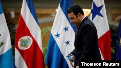 FILE PHOTO: Guatemala's President Jimmy Morales is seen before a family photo during a meeting of the Central American Integration System in Guatemala City
