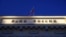 FILE - A Russian state flag flies over the Central Bank headquarters in Moscow, March 29, 2021. The sign reads "Bank of Russia". 
