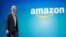 FILE - Amazon CEO Jeff Bezos walks onstage for the launch of the new Amazon Fire Phone, in Seattle, June 16, 2014.