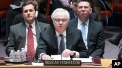 FILE - Russia's U.N. Ambassador Vitaly Churkin speaks during a U.N. Security Council meeting on the Ukraine crisis, March 15, 2014, at United Nations headquarters in New York. 