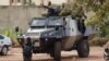 Presidential guard soldiers are seen on an armored vehicle at Laico hotel in Ouagadougou, Burkina Faso, Sept. 20, 2015. 