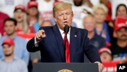 President Donald Trump speaks to supporters where he formally announced his 2020 re-election bid, June 18, 2019, in Orlando, Florida.
