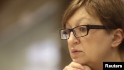 FILE - Editor-in-chief Galina Timchenko of the independent, Russia-focused, media start-up Meduza speaks during an interview in Riga, Latvia, March 30, 2015. 