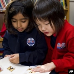 Students working together at the British School of Boston.