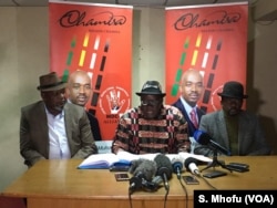 Tendai Biti of the Movement for Democratic Change (MDC) Alliance speaks to reporters in Harare, July 12, 2018.