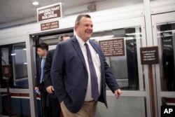 FILE - Sen. Jon Tester, D-Mont., arrives for final votes for the week, at the Capitol in Washington, Thursday, Jan. 25, 2018.