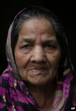 Akhtari Begum, 88, poses for the Associated Press in Lahore, Pakistan, July 31, 2017. Begum was spared many of the horrors that haunt Partition survivors thanks to the Hindu villagers who hid her away from marauding mobs and kept her safe.