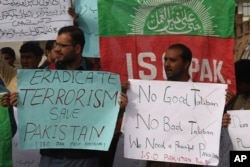 FILE - People protest against an Islamic State-claimed attack in Peshawar, Pakistan, Feb. 17, 2017.