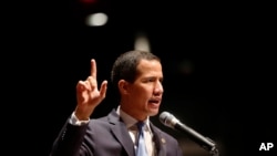 Venezuela's opposition leader and self-proclaimed interim president Juan Guaido, speaks during an event about infrastructure of the country at the Metropolitan University in Caracas, Aug. 28, 2019. 