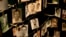 FILE - Family photographs of some of those who died in the Rwandan genocide hang in a display in a memorial center in Kigali, Rwanda, April 5, 2014.