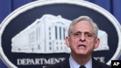 El Fiscal General Merrick Garland anuncia la extradición y apertura de una acusación acusando al expresidente hondureño Juan Orlando Hernández en el Departamento de Justicia el jueves 21 de abril de 2022 en Washington. 