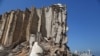FILE - Damaged grain silos are seen at the port of the Lebanese capital Beirut, June 13, 2021, almost a year after the August 4 massive explosion.