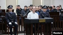 Canadian Robert Lloyd Schellenberg appears in court for a retrial of his drug smuggling case in Dalian, Liaoning province, China, Jan. 14, 2019.