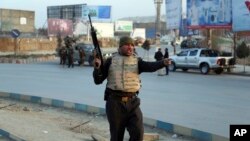 Afghan security forces arrive at the site of an explosion and attack by gunmen, in Kabul, Afghanistan, Dec. 24, 2018. 