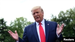 U.S. President Donald Trump speaks to reporters at the White House before departing to Fayetteville, North Carolina in Washington, Sept. 9, 2019.