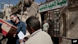 A truck loaded with goods arrives for Christian families who fled el-Arish at the Evangelical Church in Ismailia, east of Cairo, Egypt, Feb. 26, 2017. Egyptian Christians fearing attacks by Islamic State militants are fleeing the volatile northern part of the Sinai Peninsula. 