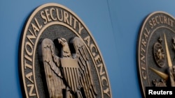 FILE - A sign outside the National Security Administration (NSA) campus in Fort Meade, Maryland.