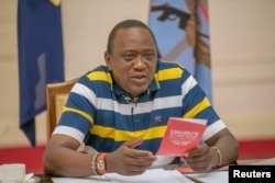 Kenya's President Uhuru Kenyatta answers questions from the public through Facebook Live at the State House in Nairobi, Kenya, July 23, 2017.