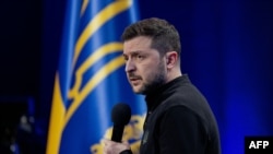 Ukraine's President Volodymyr Zelenskyy speaks during a joint press conference on the sidelines of the "Ukraine. Year 2025" forum in Kyiv on Feb. 23, 2025. 