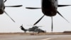 FILE - A French Eurocopter Tiger (Eurocopter EC665 Tigre) helicopter (L) takes off at the French Military base in Gao, Mali, Dec. 5, 2021.