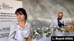 "Green moringa after-party booster juice," made from the drought-resistance moringa plant, is offered to diners at a "Future 50 Foods" tasting at the Pompidou Center in Paris.