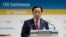 FILE - Qu Dongyu from China addresses a plenary meeting of the 41st Session of the Conference, at the FAO headquarters in Rome, June 22, 2019.