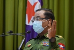 Myanmar's military spokeperson Brigadier-General Zaw Min Tun speaks during a press briefing in Naypyidaw on Jan. 26, 2021.