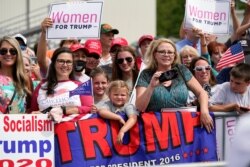 People wait to hear President Donald Trump speak at Asheville Regional Airport, August 24, 2020, in Fletcher, N.C.