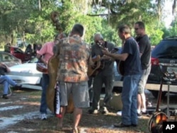 There are no speakers or amplifiers and these bluegrass musicians use only acoustic instruments.