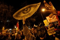 People attend a climate change protest march, as the COP25 climate summit is held in Madrid, Spain, Dec. 6, 2019.