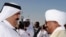 Qatari Emir Hamad bin Khalifa al-Thani (L) welcomes Sudanese President Omar al-Beshir upon his arrival in Doha to sign a peace deal between Khartoum and the Darfur rebel Justice and Equality Movement, 22 Feb 2010