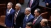 Israeli Prime Minister Benjamin Netanyahu sings the national anthem during the inauguration ceremony of Israel's 21st Knesset, or parliament, in Jerusalem, April 30, 2019. 