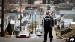 Ed Harry, a retired union leader and lifelong Democrat who voted for Donald Trump, poses for a photo in Plymouth, Pennsylvania, Jan. 5, 2017.