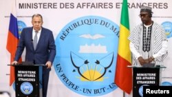 Russian Foreign Minister Sergey Lavrov and his Malian counterpart Abdoulaye Diop speak at a news conference following their talks in Bamako, Mali, Feb. 7, 2023. (Russian Foreign Ministry/Handout via Reuters)
