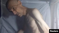 FILE - Imprisoned Iranian activist Farhad Meysami, who is reported to have gone on a hunger strike, is seen at Rajai Shahr prison in Karaj, Iran, in this social media image released Feb. 2, 2023. 