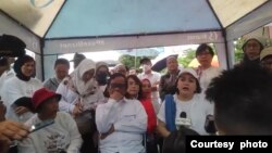 Menko Polhukam Mahfud MD bersama kementerian dan lembaga negara saat memberikan pernyataan dukungan pengesahan RUU PPRT di Jakarta Minggu (12/2/2023). Foto: Video Komnas HAM