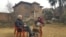 Two siblings Dr. Dildar Ahmad and Mir Noosheen Nighat, discussing work of their poet father, Rehman Rahi, who died at 97 in the Nowshera area of Srinagar in Indian-administered Kashmir. (Bilal Hussain/VOA)