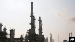 FILE - A general view of part of Tehran's oil refinery south of the capital Tehran, Iran, Dec. 22, 2014.