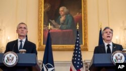 U.S. Secretary of State Antony Blinken, right, and NATO Secretary-General Jens Stoltenberg speak at a press conference after meeting at the State Department in Washington, Feb. 8, 2023.