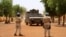 FILE - Soldiers of the U.N. peacekeeping mission in Mali MINUSMA patrol in the streets of Gao, Mali, July 24, 2019.