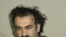A photo of alleged Sep 11, 2001 mastermind Khalid Sheikh Mohammed soon after he was arrested (file photo)
