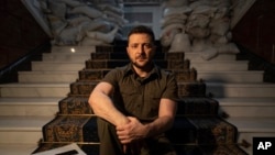 Ukrainian President Volodymyr Zelenskyy speaks during an interview with The Associated Press in his office in Kyiv, Ukraine, April 9, 2022.