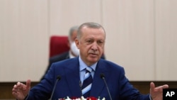 FILE - Turkey's President Recep Tayyip Erdogan speaks in Nicosia, Cyprus, July 19, 2021. 