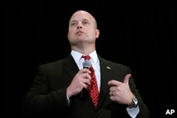 FILE - Matt Whitaker, then an Iowa Senate candidate, speaks during the Iowa Republican Party's annual Lincoln Day dinner in Cedar Rapids, Iowa, April 11, 2014.